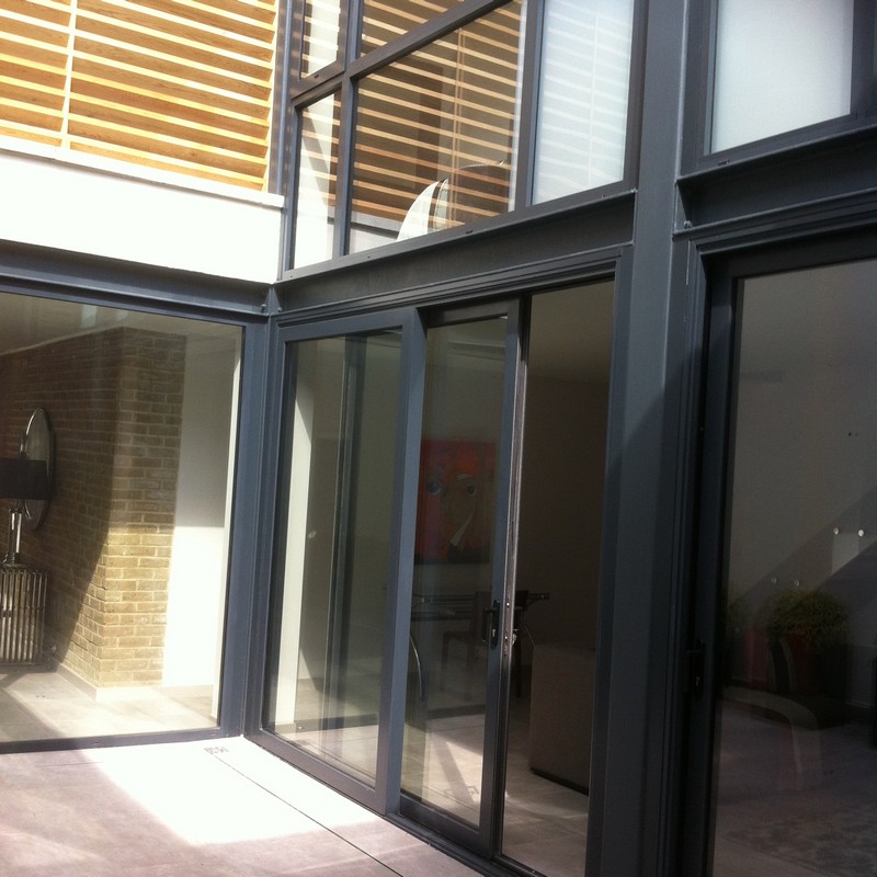 Anthracite aluminium sliding patio doors fitted in Dalston