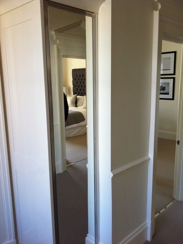 Full-length wardrobe mirror fitted in Dalston home